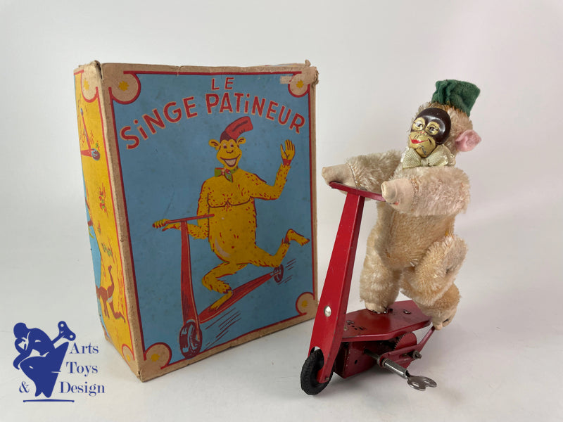 JOUET ANCIEN SFA FRANCE SINGE SUR PATINETTE MECANIQUE VERS 1950 H 16CM