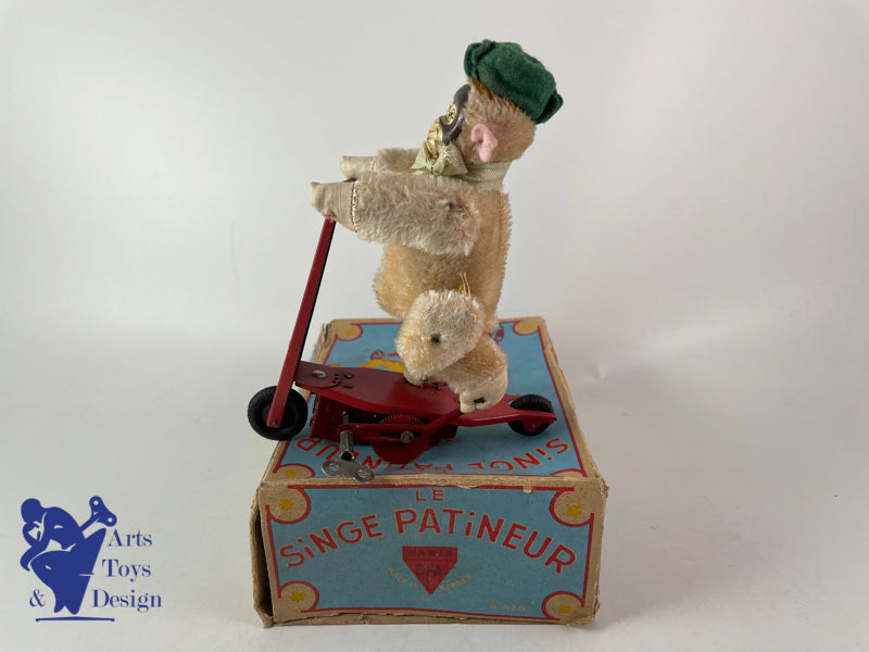 JOUET ANCIEN SFA FRANCE SINGE SUR PATINETTE MECANIQUE VERS 1950 H 16CM