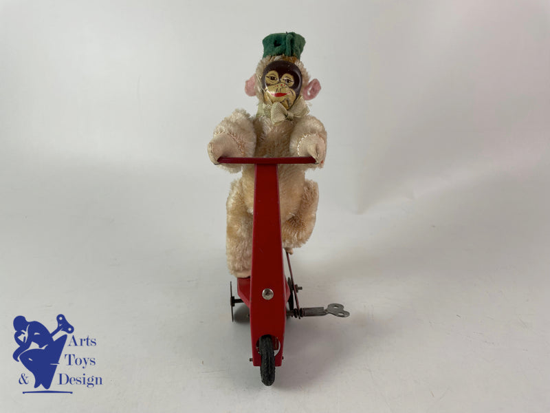 JOUET ANCIEN SFA FRANCE SINGE SUR PATINETTE MECANIQUE VERS 1950 H 16CM