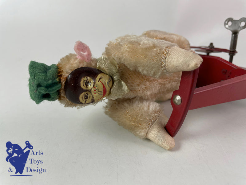 JOUET ANCIEN SFA FRANCE SINGE SUR PATINETTE MECANIQUE VERS 1950 H 16CM