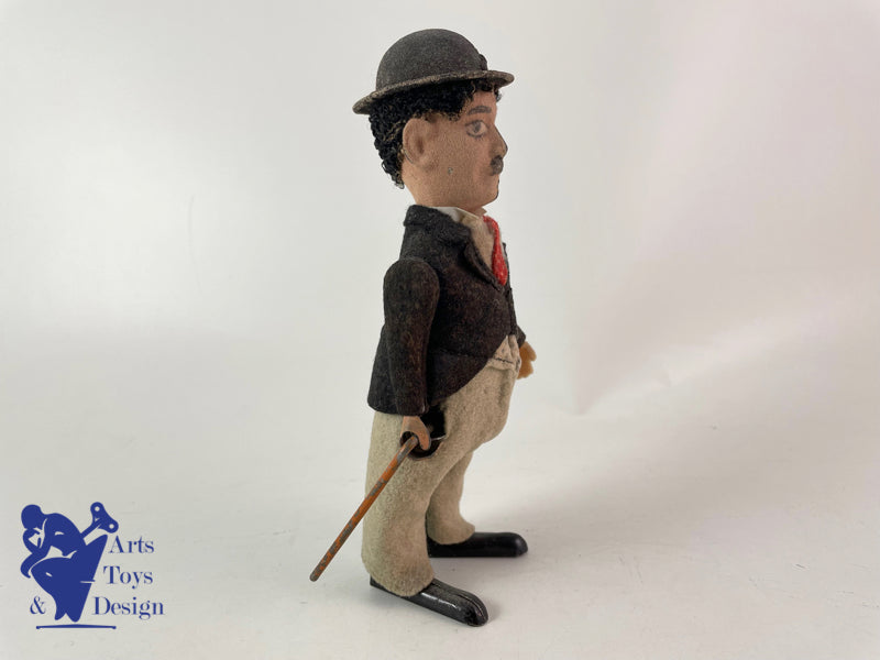 JOUET ANCIEN SCHUCO 1454 CHARLIE CHAPLIN CHARLOT VERS 1920 H 17CM
