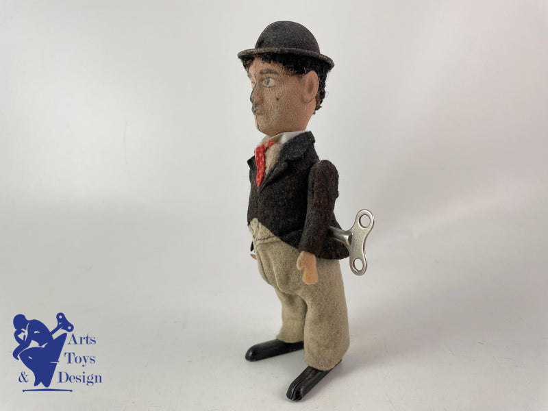 JOUET ANCIEN SCHUCO 1454 CHARLIE CHAPLIN CHARLOT VERS 1920 H 17CM