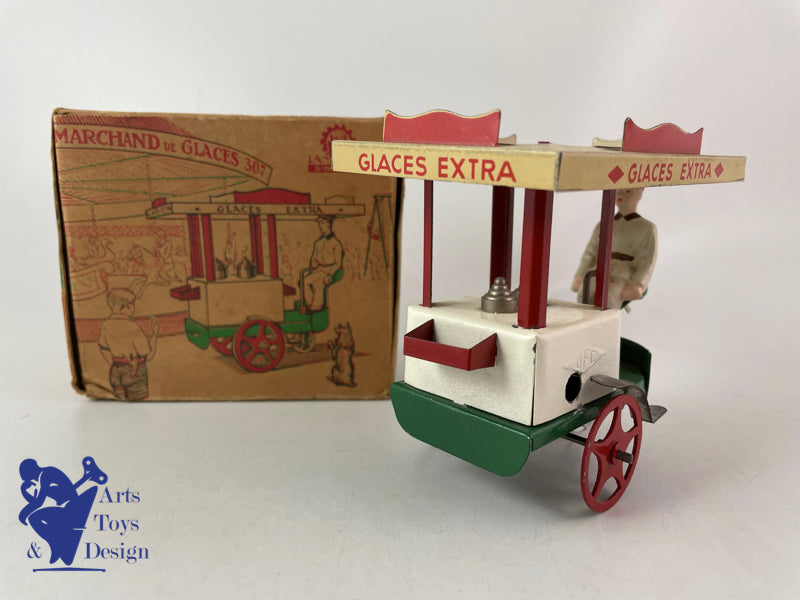 JOUET ANCIEN LA HOTTE ST NICOLAS MARCHAND DE GLACES MECANIQUE VERS 1950