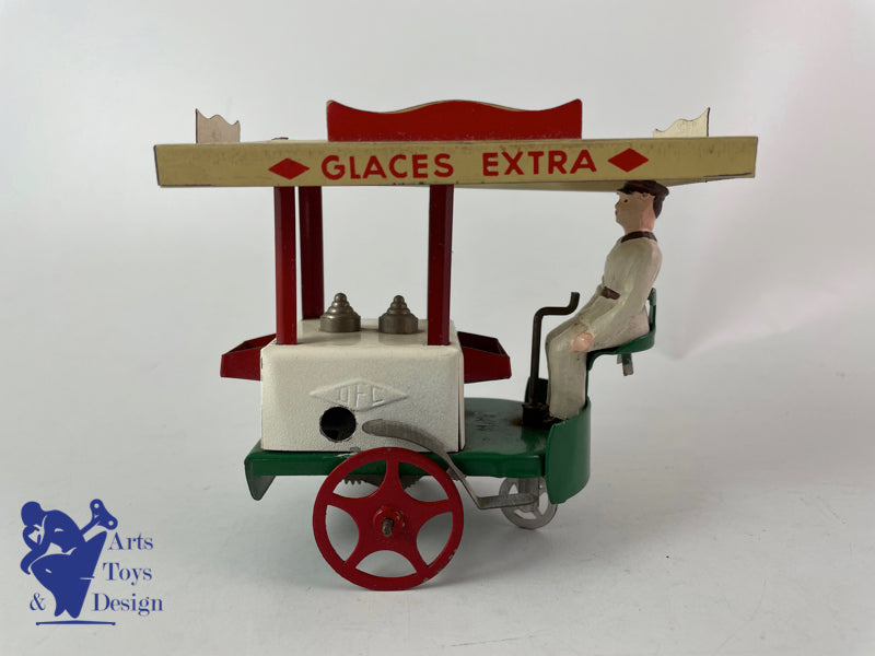 JOUET ANCIEN LA HOTTE ST NICOLAS MARCHAND DE GLACES MECANIQUE VERS 1950