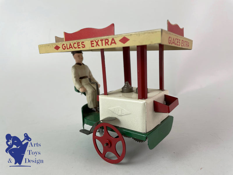 JOUET ANCIEN LA HOTTE ST NICOLAS MARCHAND DE GLACES MECANIQUE VERS 1950