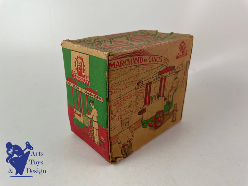 JOUET ANCIEN LA HOTTE ST NICOLAS MARCHAND DE GLACES MECANIQUE VERS 1950