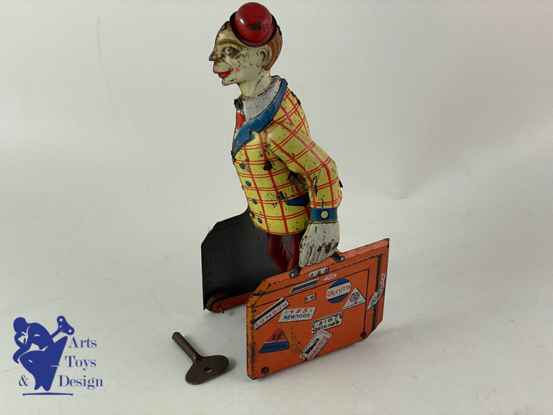 DISTLER ALLEMAGNE CLOWN AVEC VALISES MECANIQUE 1920